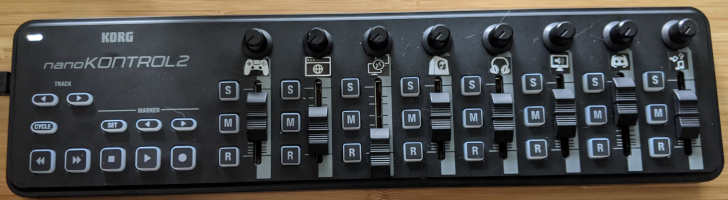 Example of a nanoKONTROL2 with faders labeled with icons. nanoKONTROL2
